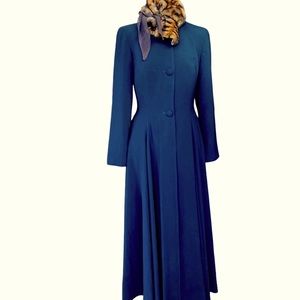 Dramatic swing coat! Designed by the 1st African American to show at the Emmies